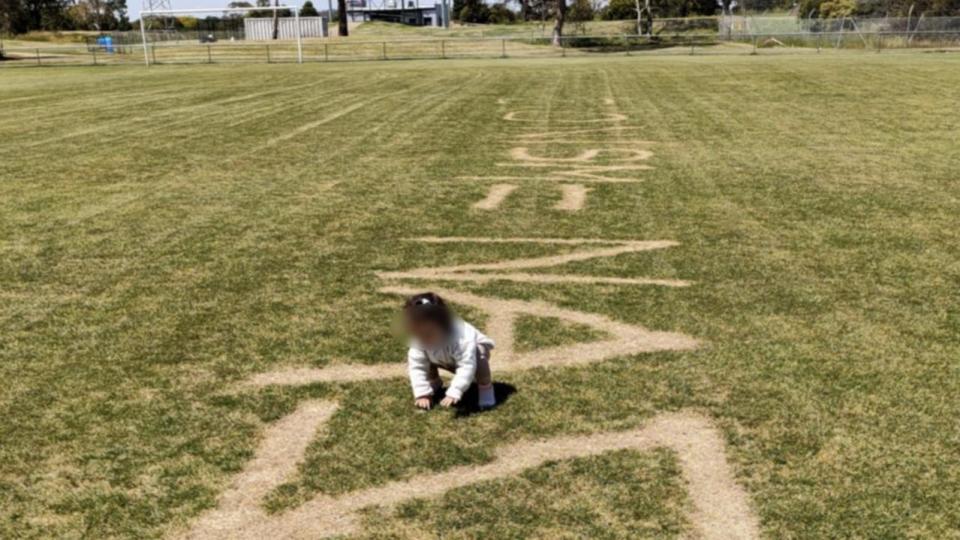 Traumatising Big message left burned into grass at children’s playground